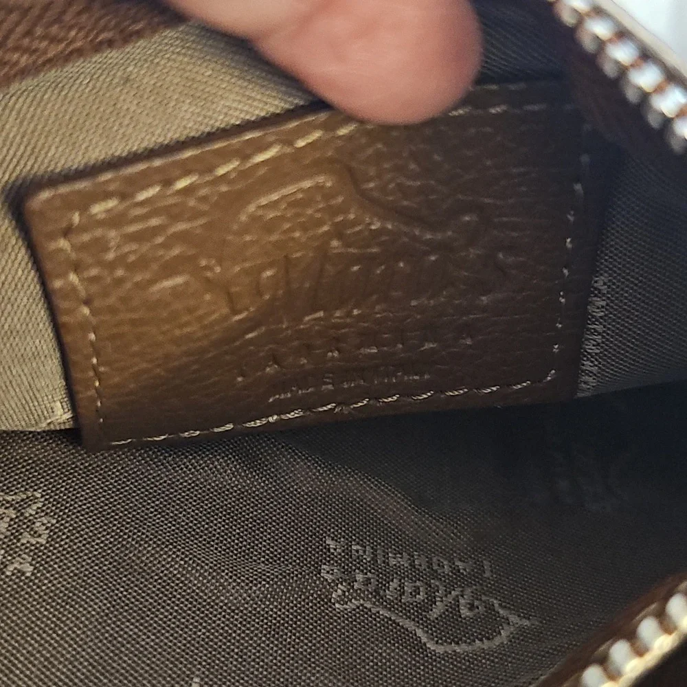 Brown Leather and‎ Suede Zippered Pouchees. Conected With Key Ring.